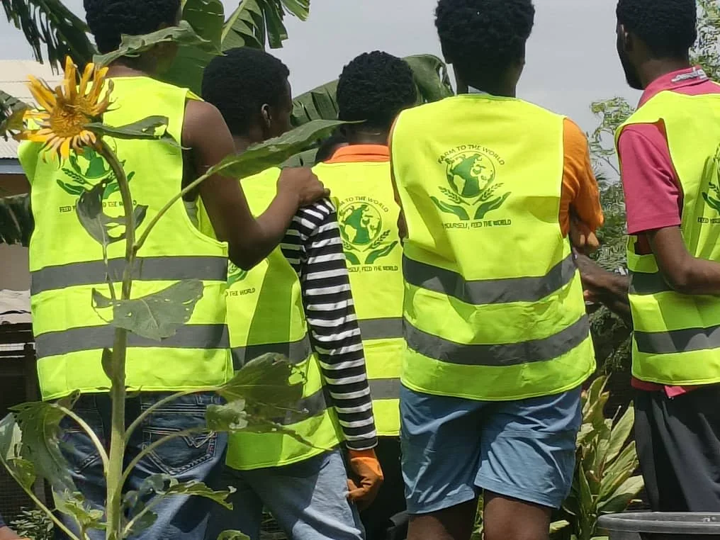 University of Ghana students wearing Farm to the World safety vests during field training